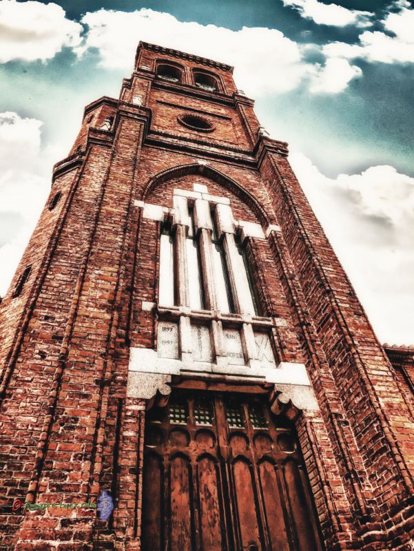 Torre de la Parroquia de San Andres Reducc.jpg